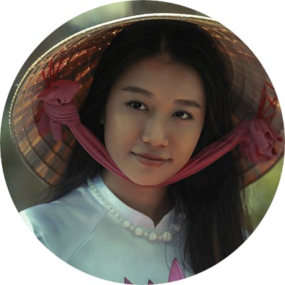 a picture of a woman, cropped to an ellipse